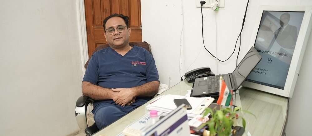 "Dr. Ankit Agrawal cardiologist at Infinity Heart Hospital Jabalpur in his consulting office"