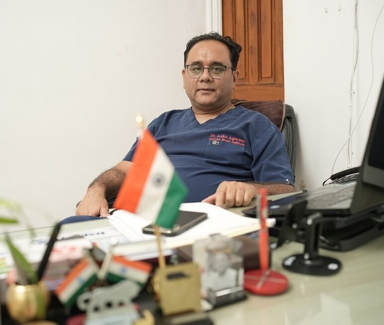 "Dr. Ankit Agrawal cardiologist at Infinity Heart Hospital Jabalpur in his consulting office"