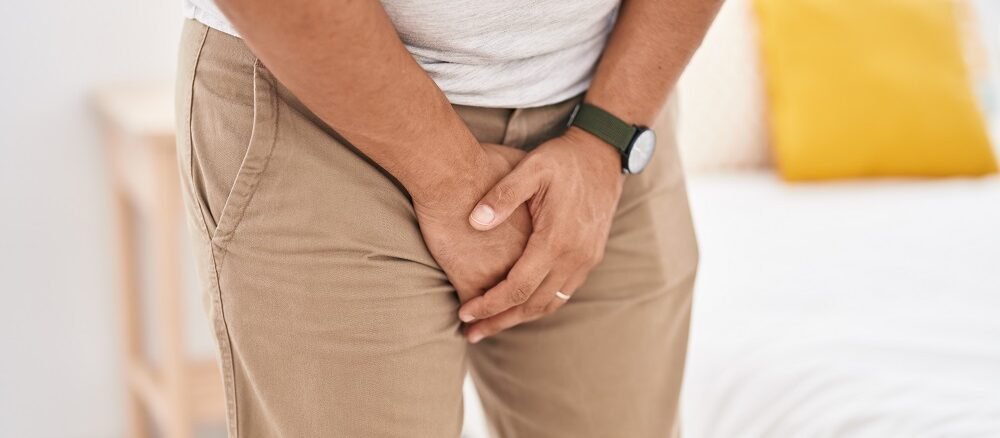 "Doctor examining newborn baby with stethoscope during health checkup on white blanket"